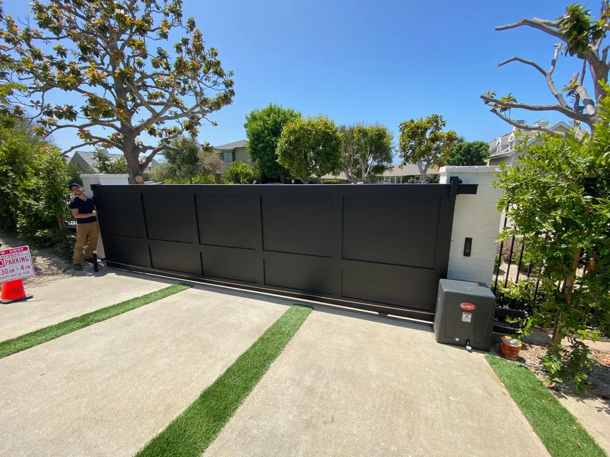 Automated driveway gate powered by a LiftMaster operator